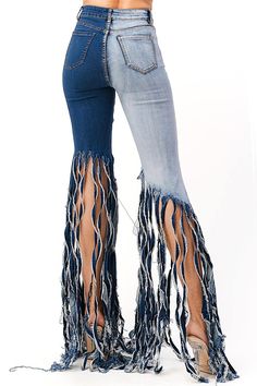 High-rise, bell bottom flares with a 2-tone denim wash and shredded fringe tassels from the knee down. Traditional 5-pocket construction with a zip fly and button closure. Looks great dressed up with heels and blouse. This style is truly one of a kind. However as with any distressed jeans, some minor flaws may be present such as torn fringe tassels or cuts and uneven colors. Each item is inspected for quality. CARE | Hand Wash or Machine Wash Gentle in a Wash Bag CONTENTS | 98% Cotton, 2% Spande Wornstar Clothing, Diy Ripped Jeans, Denim Diy Clothes, Cut Up Shirts, Lace Jeans, Blue Jeans Crafts, Torn Jeans, African Lace Dresses, Denim Ideas