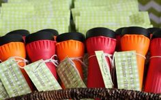 many cups and tea bags in a basket