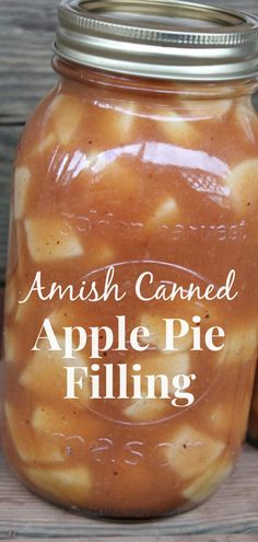 an apple pie filling in a jar with the words, amish canned apple pie filling