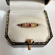 This Is A Vintage 18k Yellow Gold Diamond And Ruby Five-Stone Anniversary Ring. Hallmarked (Pictured) For 750, Or 18k Gold. Size 4 3/4 (4 And 3/4). A Beautifully Preserved Vintage Heirloom Piece! Luxury Multi-stone Ruby Ring In Gold, Luxury Gold Ruby Ring With Multi-stone, Luxury Multi-stone Gold Ruby Ring, Exquisite Multi-stone Yellow Gold Ruby Ring, Exquisite Yellow Gold Ruby Ring For Wedding, Exquisite Yellow Gold Ruby Wedding Ring, Luxury Hallmarked Yellow Gold Ruby Ring, Luxury Yellow Gold Ruby Ring Hallmarked, Oval Multi-stone Ruby Ring In Yellow Gold