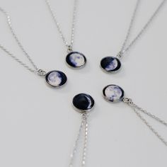 IMPORTANT NOTE: For Expected Delivery for Father's Day please order by June 9th. I recommend ordering with Priority Mail (usually 2-3 business days but can be longer). However I can only guarantee Priority Express Mail shipping will arrive in time. A custom moon phase necklace that glows in the dark. ◆ Quick Turnaround 2-5 days! ◆ Fast Shipping! ◆ Jewelry comes in a luxurious jewelry box! HOW TO ORDER Simply type your date in the personalization box. For optional Back Engraving please let me kno Customizable Blue Round Jewelry, Adjustable Moon Phase Necklace For Gift, Moon Print Moon Shaped Necklace Gift, Moon Print Moon Shaped Necklace For Gift, Moon Print Moon-shaped Necklace Gift, Moon Shaped Necklace With Moon Print For Gift, White Sun And Moon Design Jewelry Gift, White Sun And Moon Design Jewelry For Gift, Moon Shaped White Necklace For Gift