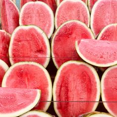 several slices of watermelon sitting on top of each other