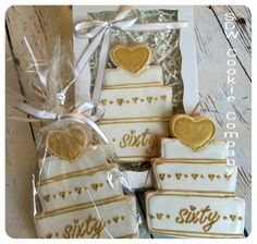 some cookies are wrapped in plastic and have gold hearts on them with the words sitty