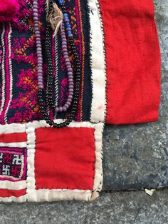 Vintage tribal Dao Quan Chet ceremonial veil. Age is over 35 years and very good condition. The women worn it in head with traditional costume in ceremonial days.The people call it like the padded floppy ceremonial veil ,has its traditional Mien embroidery ornamented by lots of silk cotton pompons,and glass and ceramics and plastic beads pendants. It is produced with handmade,hand embroidered,hand stitched applique,hand sawed in silk cotton threads. Look great to make decoration or hang it on th Transitional Bohemian Dupatta For Traditional Ceremonies, Handloom Dupatta For Festival, Bohemian Dupatta With Woven Motifs For Ceremonial Use, Bohemian Dupatta For Rituals, Bohemian Red Dupatta With Border, Bohemian Dupatta For Festivals And Rituals, Bohemian Dupatta With Weaving Work For Festival, Bohemian Dupatta For Puja, Bohemian Dupatta With Woven Motifs For Transitional Season