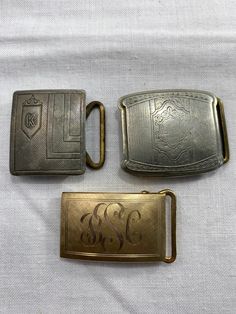 2-Edwardian Silver Plated  And 1 Gold Filled Monogramed Belt Buckles Lot Of 3 1- Wolverine silverplate buckle etched design 1-Silverplated with a K monogram 1 12 K Gold Filled monogramed belt buckle BSC Formal Gold Engraved Belt Buckles, Antique Engraved Belt Buckles For Formal Wear, Vintage Engraved Belt Buckles For Formal Occasions, Vintage Engraved Belt Buckles For Formal Wear, Silver Rectangular Belt Buckles For Formal Occasions, Vintage Engraved Rectangular Belt Buckles, Vintage Rectangular Engraved Belt Buckles, Vintage Silver Engraved Belt Buckle, Vintage Silver Stamped Belt Buckles