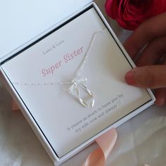 - Elegant bow necklace perfect as a Birthday gift - Silver bowknot design necklace  - Thoughtful gift for sister - The perfect gift for your sister to show her how much she means to you White Ribbon Necklace For Gift, Silver Ribbon Necklace For Gift, Sterling Silver Ribbon Jewelry For Gifts, Sterling Silver Jewelry With Ribbon For Gift, Adjustable Necklace For Gift Occasions, Adjustable Necklace For Gifts, Adjustable Ribbon Necklace For Gift, Adjustable Ribbon Necklace For Gifts, Adjustable Ribbon Jewelry Gift