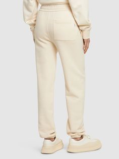 Elastic waistband with drawstring. Elastic cuffs at hem. Two side pockets. One back patch pocket. Model is wearing a sizeS Cuffed Sweatpants, Sporty Pants, Cotton Sweatpants, Grey Sweatpants, Back Patch, Jogger Sweatpants, Womens Sweatpants, Lounge Pants, Jil Sander