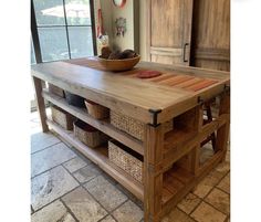 a large wooden table with baskets on top