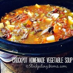 crockpot homemade vegetable soup in a slow cooker