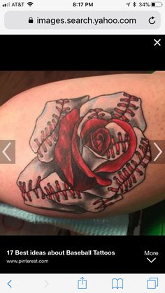 a baseball tattoo with a rose on it