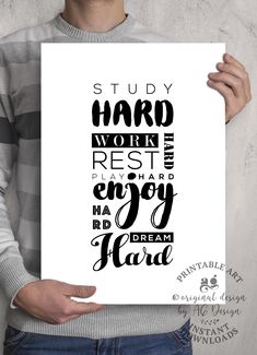 a man holding up a poster with the words study hard work rest enjoy and be happy