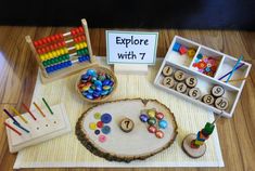 a wooden table topped with lots of toys