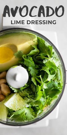 avocado lime dressing in a blender with cashews and cilantro