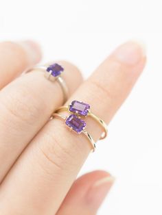 A unique spin on a modern classic. The Lady's Mantle Amethyst ring stuns with an amethyst center stone of a rich purple. It's a great present for those born in the month of love, February. 14k Gold Amethyst Open Ring, Purple Birthstone Ring In 14k Gold, 14k Gold Amethyst Ring With Lavender Gemstone, 14k Gold Lavender Amethyst Ring, 14k Gold Purple Emerald Cut Rings, 14k Gold Amethyst Open Ring For Anniversary, Purple Birthstone Ring In 14k Gold For Promise, Purple Gemstone Birthstone Ring With Open Band, 14k Gold Open Amethyst Ring