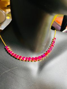 This necklace  will elevate your whole outfit for any special occasions.  Unheated Burmese Ruby Necklace in 18K Yellow  Gold.  Weight of Ruby   25 pcs   10 ct Total weight of necklace  8.8 gm Length and width of each ruby   3.97 x 3.97 mm , 4.0 x 3.63 mm , 4.50 x 4.60 mm ,5.68 x 4.72 mm ,5.97 x 3.97 mm ,5.13 x 4.51 mm , 4.39 x 3.67 mm  (average) Length of necklace - 42 cm Length and width of Ruby  100 x 5.52 mm Gemstone  -  Unheated Natural Burmese Ruby Treatments -  None Colour  -  Intense Red Simple Ruby Necklace Designs, Ruby Necklace Designs, Mogok, Burmese Ruby, Ruby Necklace, July Birthstone, Burmese, Wedding Jewellery Necklace, Wedding Necklace