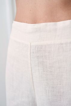 "Get office ready with our RILEY pants that are so comfortable you will want to wear them everywhere. FABRIC: 100% softened Lithuanian linen COLOR: Please choose the desired color from the side menu. STYLE: Cropped linen pants with rubber at the back. SIZE CHART: XS Bust 28- 31\" (72- 80 cm) Waist 20- 22.5\" (51- 58 cm) Hips 31.5 -34.5\" (80- 87 cm) S Bust 31.5- 35\" (80- 88 cm) Waist 23- 26.5\" (59- 68 cm) Hips 35- 38\" (88- 96 cm) M Bust 35- 38\" (89- 96 cm) Waist 27- 30\" (69- 76 cm) Hips 38- Linen Straight Leg Capris With Elastic Waistband, Straight Leg Linen Capris With Elastic Waistband, Natural Linen Bottoms For Summer, Wide-leg Linen Capris With Elastic Waistband, Natural Linen Summer Bottoms, Fitted Linen Bottoms With Elastic Waistband, Beige Linen Straight Pants, Relaxed Fit Linen Ankle-length Capris, Linen Capris With Relaxed Fit