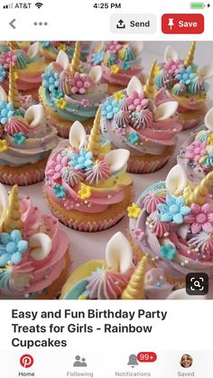 cupcakes decorated with colorful frosting and unicorn hats on top of each other