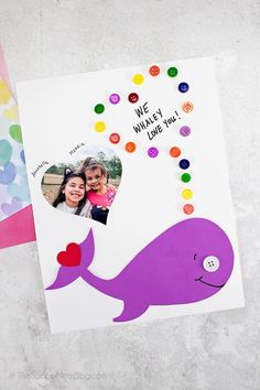 an image of a card with the words we whaley love you and two photos