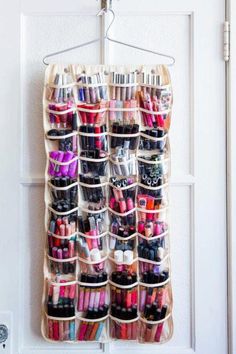 an over the door hanging organizer with lots of lipstick