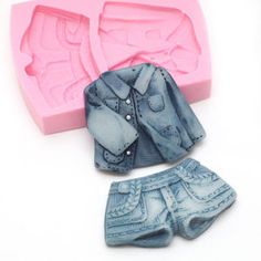 two plastic molds with clothes on them, one is pink and the other is blue