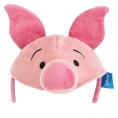 a pink piggy hat with ears on it