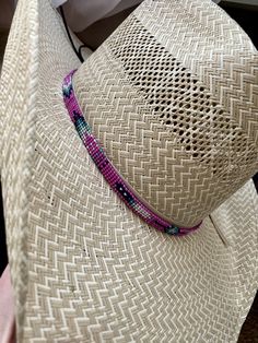 "1/4\" wide Pink Arrow Hat Band. All bead work is beaded with 10lb extreme braided nylon line. All hat bands are finished at 23\" with glued than sewed down leather ends and an adjustable leather tie." Adjustable Handwoven Straw Hat For Kentucky Derby, Handwoven Adjustable Straw Hat For Kentucky Derby, Adjustable Multicolor Ranch Hats, Western Braided Hat Band For Festivals, Adjustable Handwoven Hat Bands For Rodeo, Adjustable Country Hat Bands For Kentucky Derby, Western Style Adjustable Handwoven Hat Band, Adjustable Country Style Hat Band For Kentucky Derby, Adjustable Handwoven Straw Hat For Rodeo