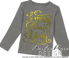 a gray t - shirt with gold lettering on it that says, the little miss new year