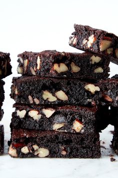 a stack of brownies sitting on top of a white counter