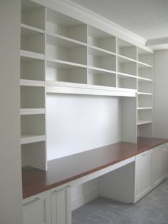 an image of a room with built in bookshelves