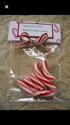 red and white candy canes wrapped in cellophane