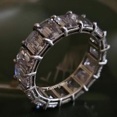 a diamond ring is shown on a table