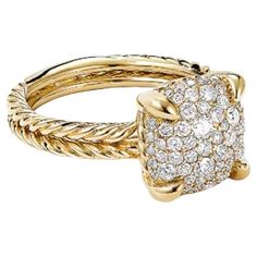 a gold ring with diamonds on it