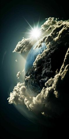 the earth is surrounded by clouds and sun