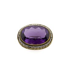 This is one of the most dazzling gemstone brooches we've had in the studio. Set in 14k yellow gold, the deep rich purple amethyst stone sits surrounded by tiny seed pearls, a favorite style of the Victorian Era. This brooch boasts an old world finish and will look beautiful with anything you care to pair it with. Victorian Gold Oval Amethyst Ring, Antique Oval Purple Jewelry, Oval Purple Jewelry Brooch, Victorian Amethyst Round Jewelry, Estate Wedding Ring, Victorian Oval Brooch, Gemstone Brooch, Gem Diamonds, Contemporary Ring