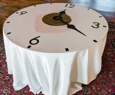 a round table with a clock on it