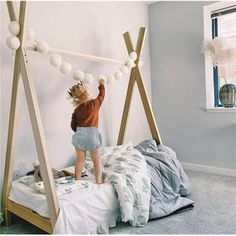 How fun is this twin sized teepee bed frame?! This is the perfect combination of fun for your little one in a timeless and simplistic style. This is a sturdy product made from unfinished solid knot free furniture grade poplar. You can stain or paint any color you wish or you can leave the item unfinished. Your bed purchase plants trees too! We plant one tree for every bed sold through One Tree Planted foundation! Available in either twin or full size. Color: Brown. Teepee Bed Frame, Montessori Toddler Room, Montessori Toddler Rooms, Twin House Bed, Toddler House Bed, Toddler Floor Bed, Teepee Bed, House Frame Bed, Solid Wood Platform Bed