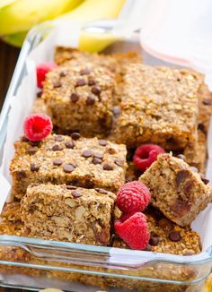 granola bars with raspberries and chocolate chips in a glass dish