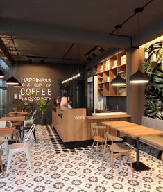 the interior of a coffee shop with tables and chairs