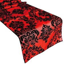 a red and black table cloth on a white background