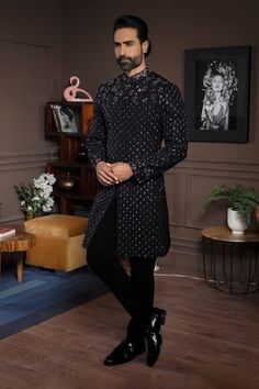 Black full sleeves band collar sherwani with all over Stellar bloom embroidery. Paired with a trouser. - Aza Fashions Designer Ceremonial Kurta With Mirror Work, Designer Long Sleeve Kurta For Festive Occasions, Designer Straight Kurta With Mirror Work, Designer Straight Kurta For Reception, Designer Long Sleeve Sherwani With Mirror Work, Ceremonial Long Sleeve Sherwani With Mirror Work, Trouser Men, Bloom Embroidery, Band Collar