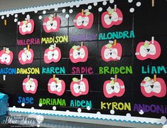 an apple themed bulletin board with name tags