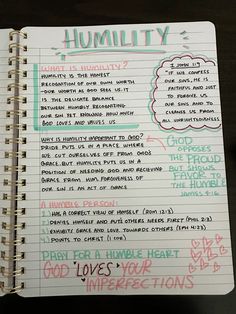 a notepad with writing on it that says humility and the words in different languages