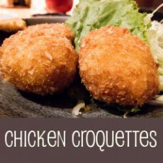 chicken croquettes on a plate with lettuce