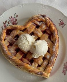 a heart shaped pie with ice cream on top