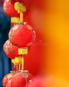 red paper lanterns hanging from the ceiling with blurry background royalty images and clippings