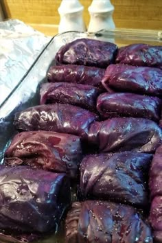 there are purple food wrapped in foil and ready to be eaten