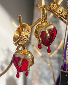 "Mirror Mirror on the wall, who is the fairest one of all?" You will be, after putting on these hearts dipped in gold. ✦ 18k gold plated copper material✦ hypoallergenic for sensitive ears✦ heart measures 2.5cm x 3.5cm✦ available in gold only book pictured: Fierce Fairytales by Nikita Gill Unique Gold Earrings For Valentine's Day, Unique Gold Heart Earrings, Unique Gold Heart-shaped Earrings, Queen Earrings, Nikita Gill, Face Drawing Reference, Mirror Mirror On The Wall, Mirror On The Wall, Heart Box