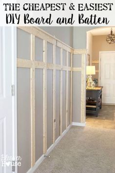 a room that is being remodeled with some wood framing on the wall and carpeted floor