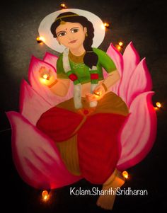 an image of a woman sitting on top of a pink flower with candles around her