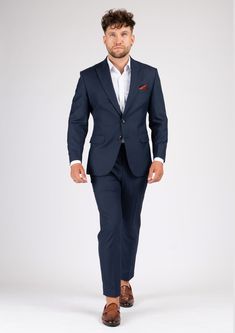 The Bryant Navy Sharkskin Suit is the perfect choice for any smart occasion. Crafted with a luxurious navy sharkskin fabric and custom made for a premium appearance, it has a deep blue color, a stylish and modern cut, and will make you look and feel confident. Navy Fitted Suit With Notch Lapel, Navy Slim Fit Suit With Notch Lapel, Navy Fitted Double Breasted Suit With Notch Lapel, Navy Double-breasted Suit With Notch Lapel, Luxury Navy Double Breasted Suit For Business, Elegant Fitted Navy Blazer, Navy Notch Lapel Tuxedo In Suiting Fabric, Navy Professional Office Suits, Modern Blue Suits With Notch Lapel